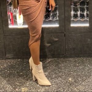 Stone color heeled booties; 4”.